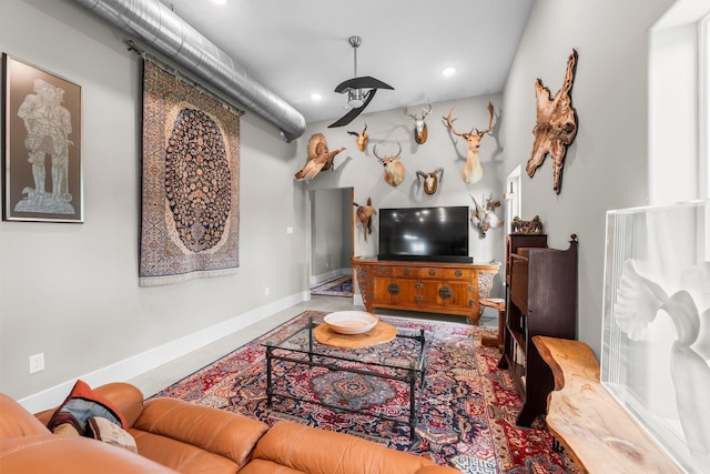 43 Windmill Dr, Hempstead, TX 77445 - living room featuring baseboards and recessed lighting