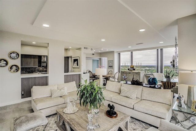 14 Greenway Plz Unit 15Q, Houston, TX 77046 - living room featuring recessed lighting, floor to ceiling windows, and light wood-style floors