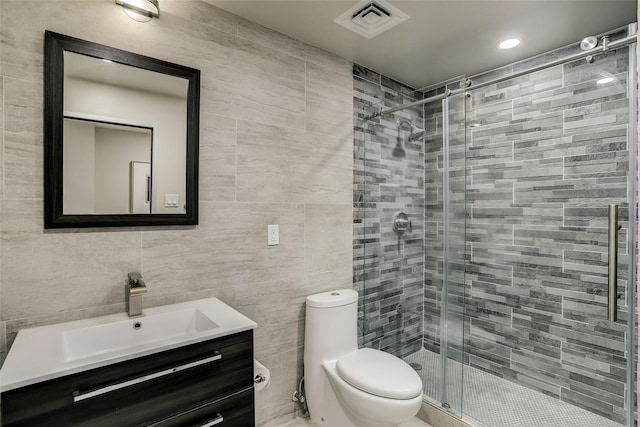 14 Greenway Plz Unit 15Q, Houston, TX 77046 - full bathroom with tile walls, vanity, and a stall shower