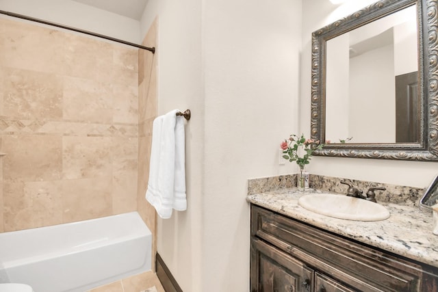 1241 W 24th St Unit B, Houston, TX 77008 - bathroom with vanity, washtub / shower combination, and tile patterned flooring