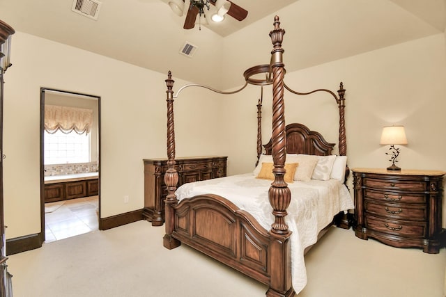 1241 W 24th St Unit B, Houston, TX 77008 - bedroom with lofted ceiling, connected bathroom, light colored carpet, and a ceiling fan
