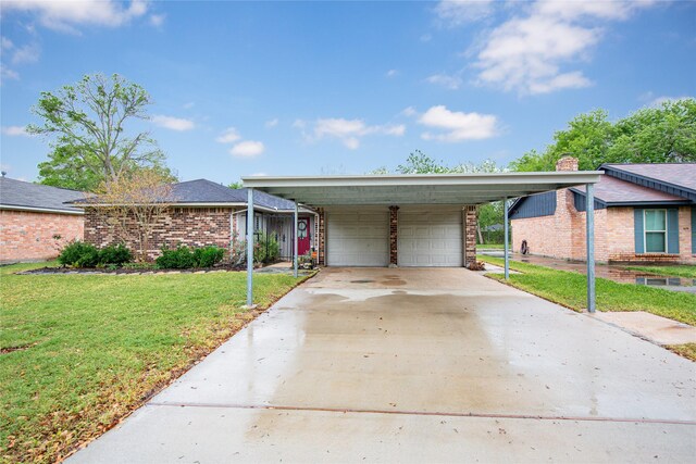 2026 Briar Ridge Dr, Rosenberg, TX 77471 - view of front of property featuring a front yard, a chimney, brick siding, and a garage