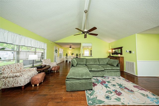 2026 Briar Ridge Dr, Rosenberg, TX 77471 - living room featuring hardwood / wood-style floors, a ceiling fan, a textured ceiling, and vaulted ceiling