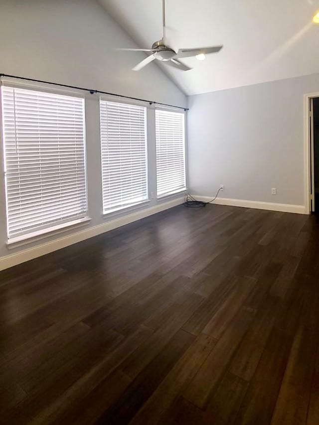 7447 Cambridge St Unit 8, Houston, TX 77054 - unfurnished room with vaulted ceiling, a ceiling fan, and dark wood-style floors