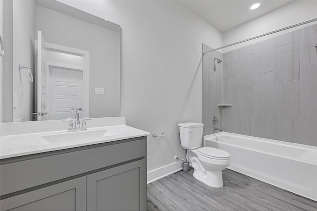 10329 S Goshawk Trl, Conroe, TX 77385 - full bath featuring vanity, tub / shower combination, and wood finished floors