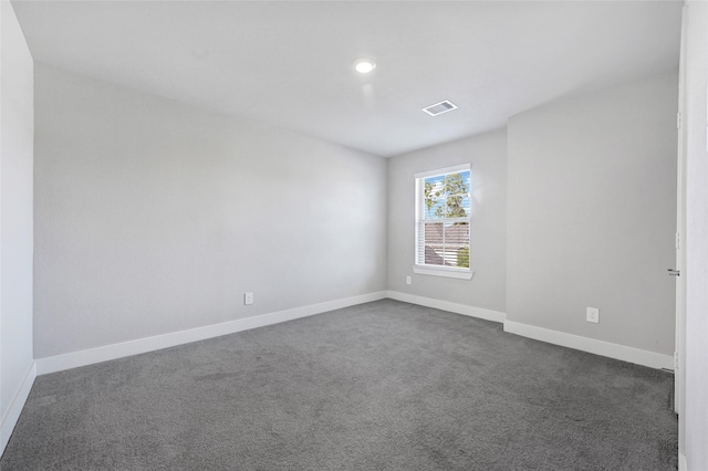 10329 S Goshawk Trl, Conroe, TX 77385 - unfurnished room with dark colored carpet and recessed lighting
