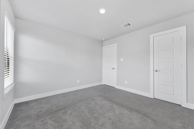 10329 S Goshawk Trl, Conroe, TX 77385 - unfurnished room featuring carpet and baseboards