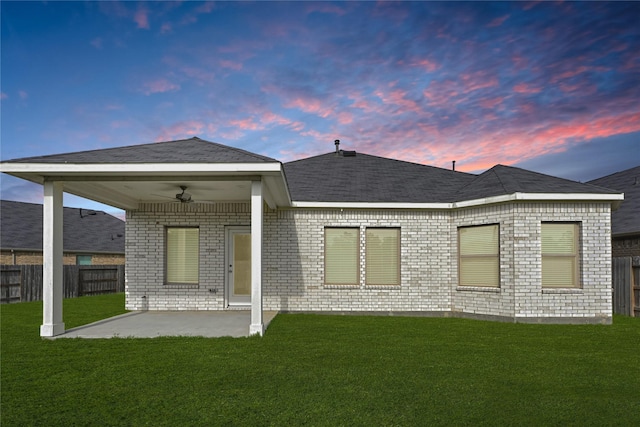 10329 S Goshawk Trl, Conroe, TX 77385 - back of house featuring a ceiling fan, a patio, and brick siding