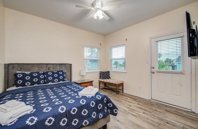 16713 Kingston Way, Jamaica Beach, TX 77554 - bedroom featuring wood finished floors and a ceiling fan