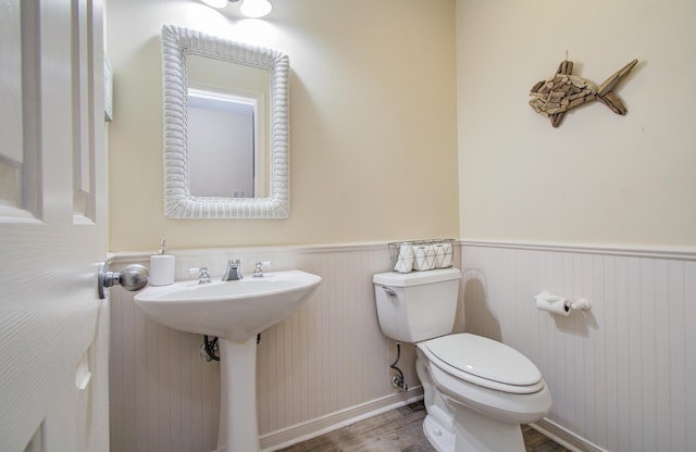 16713 Kingston Way, Jamaica Beach, TX 77554 - half bath featuring wainscoting and wood finished floors