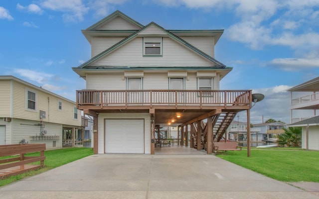 16713 Kingston Way, Jamaica Beach, TX 77554 - view of front of property featuring a carport, a front lawn, a garage, driveway, and stairs