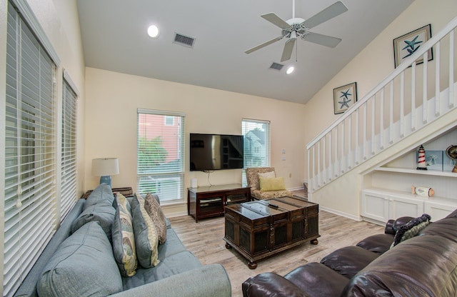 16713 Kingston Way, Jamaica Beach, TX 77554 - living area featuring light wood-style flooring, a ceiling fan, stairway, high vaulted ceiling, and recessed lighting
