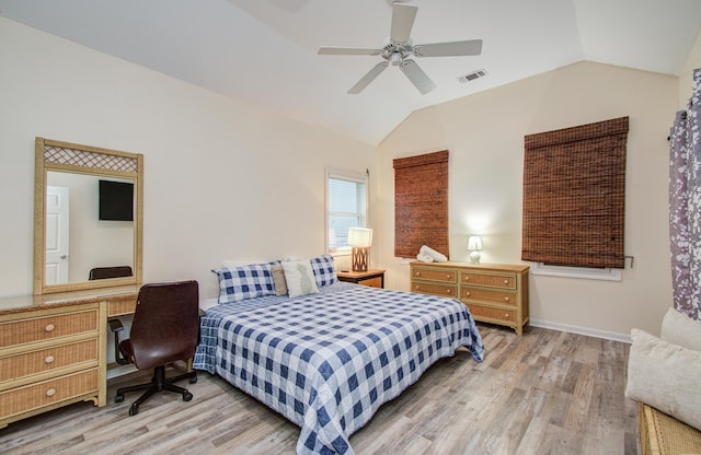 16713 Kingston Way, Jamaica Beach, TX 77554 - bedroom with lofted ceiling, light wood finished floors, and a ceiling fan