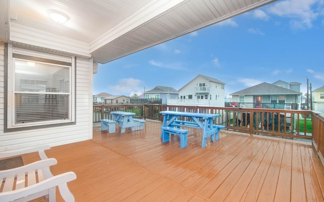 16713 Kingston Way, Jamaica Beach, TX 77554 - deck featuring a residential view and outdoor dining area