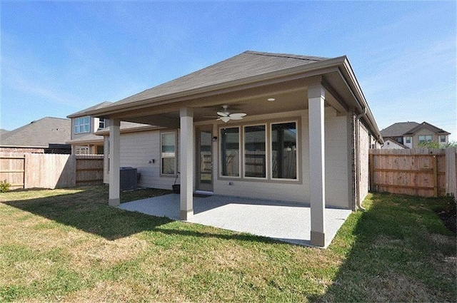 15619 Hanover Breeze Ln, Houston, TX 77044 - back of property featuring ceiling fan, a patio, and a fenced backyard