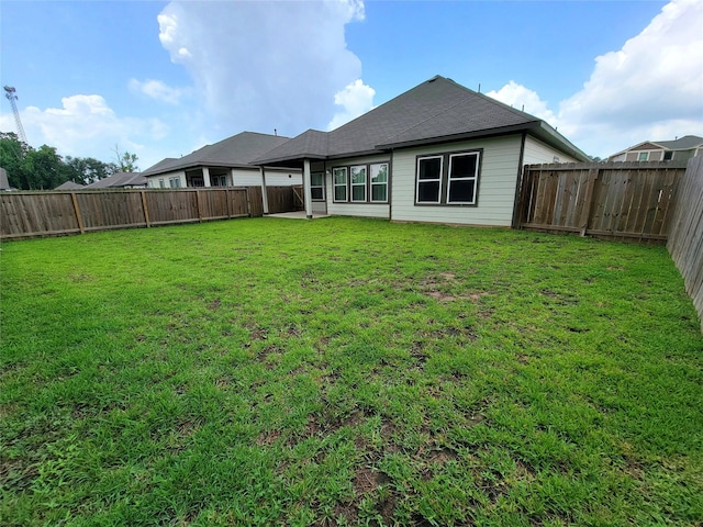 2320 Cedar Place Dr, Conroe, TX 77306 - rear view of house with a fenced backyard