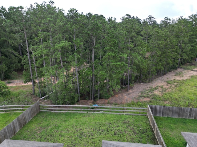 2320 Cedar Place Dr, Conroe, TX 77306 - view of yard featuring a forest view