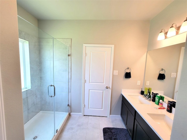 2320 Cedar Place Dr, Conroe, TX 77306 - full bathroom with double vanity, tile patterned floors, and a shower stall