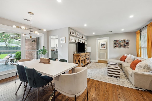 6210 Darnell St, Houston, TX 77074 - dining space with wood finished floors and recessed lighting