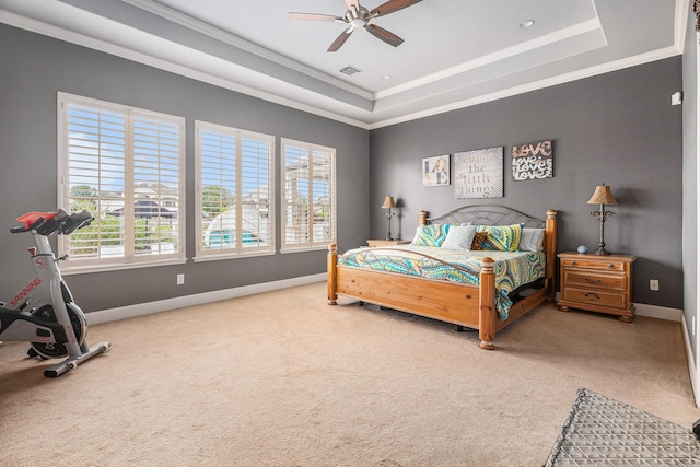 3038 S Island Dr, Seabrook, TX 77586 - bedroom featuring a raised ceiling, carpet flooring, crown molding, and a ceiling fan