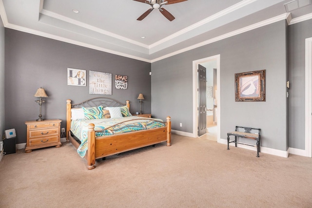 3038 S Island Dr, Seabrook, TX 77586 - bedroom with carpet flooring, a raised ceiling, ornamental molding, ensuite bathroom, and a ceiling fan