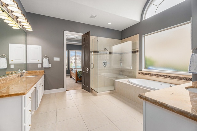 3038 S Island Dr, Seabrook, TX 77586 - ensuite bathroom with vanity, a stall shower, a bath, and tile patterned floors
