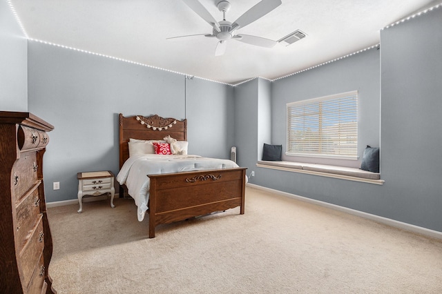 3038 S Island Dr, Seabrook, TX 77586 - bedroom with carpet floors and a ceiling fan