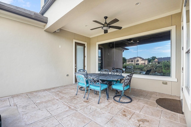 3038 S Island Dr, Seabrook, TX 77586 - view of patio featuring a ceiling fan and outdoor dining space