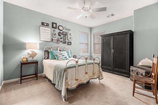 3038 S Island Dr, Seabrook, TX 77586 - bedroom featuring light colored carpet and a ceiling fan