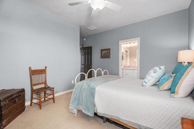 3038 S Island Dr, Seabrook, TX 77586 - bedroom featuring carpet flooring, ensuite bathroom, and a ceiling fan