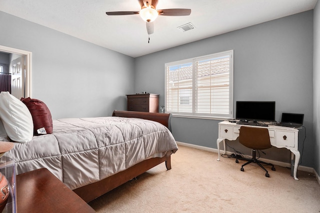 3038 S Island Dr, Seabrook, TX 77586 - bedroom with carpet flooring, a ceiling fan, and a desk