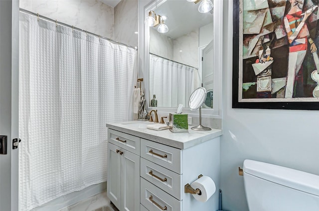 4622 Banning Dr, Houston, TX 77027 - full bath featuring marble look tile flooring and vanity
