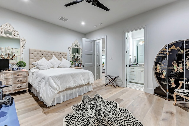 4622 Banning Dr, Houston, TX 77027 - bedroom with light wood finished floors, recessed lighting, connected bathroom, and a ceiling fan