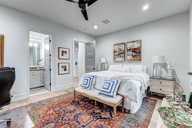 4622 Banning Dr, Houston, TX 77027 - bedroom with light wood-style floors, ensuite bath, recessed lighting, and a ceiling fan
