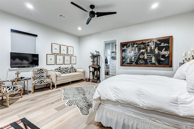 4622 Banning Dr, Houston, TX 77027 - bedroom featuring wood finished floors, recessed lighting, and a ceiling fan