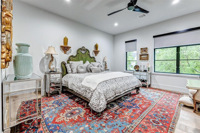 4622 Banning Dr, Houston, TX 77027 - bedroom featuring recessed lighting, ceiling fan, and wood finished floors
