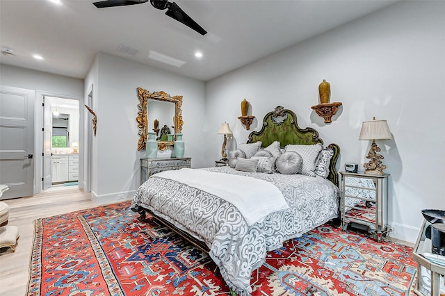 4622 Banning Dr, Houston, TX 77027 - bedroom featuring recessed lighting, light wood-style floors, ensuite bath, and a ceiling fan