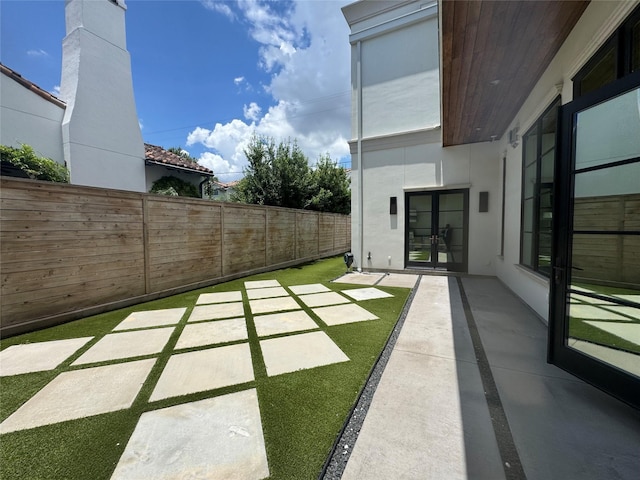 4622 Banning Dr, Houston, TX 77027 - view of yard with a patio area and french doors