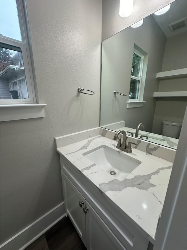 14159 Lakepoint Dr, Willis, TX 77318 - bathroom featuring vanity and wood finished floors