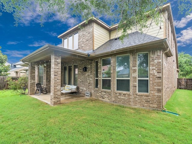 3314 Flint Valley Ln, Katy, TX 77494 - rear view of house with brick siding and a patio area
