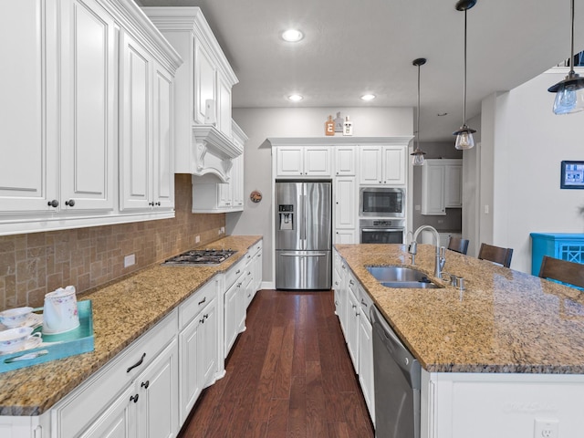 3314 Flint Valley Ln, Katy, TX 77494 - kitchen featuring appliances with stainless steel finishes, a kitchen island with sink, white cabinetry, and recessed lighting