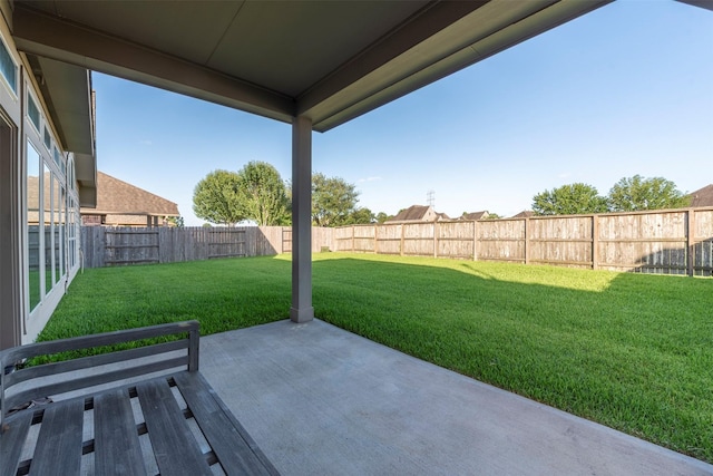 2407 Lost Bridge Ln, Pearland, TX 77584 - fenced backyard with a patio area