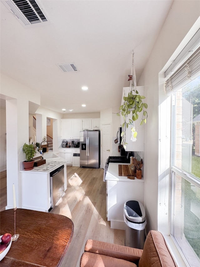 2415 Jasmine Ridge Ct, Houston, TX 77062 - dining room featuring light wood-type flooring and recessed lighting