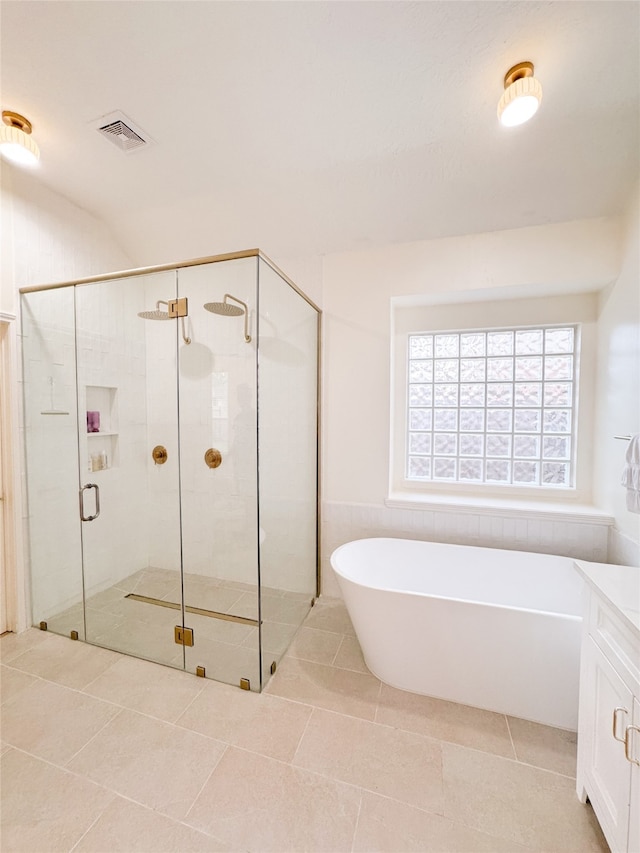 2415 Jasmine Ridge Ct, Houston, TX 77062 - bathroom with a freestanding bath, a shower stall, tile patterned flooring, and vanity