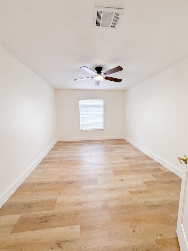 2415 Jasmine Ridge Ct, Houston, TX 77062 - spare room with a ceiling fan and light wood-style floors