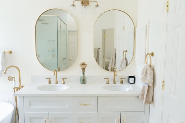 2415 Jasmine Ridge Ct, Houston, TX 77062 - full bathroom featuring a shower stall and double vanity