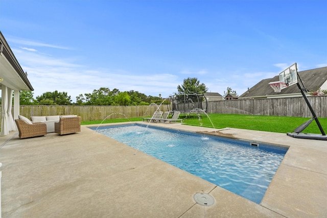 2307 Hagerman Rd, Conroe, TX 77384 - view of swimming pool with a trampoline, a fenced backyard, a patio area, and an outdoor living space