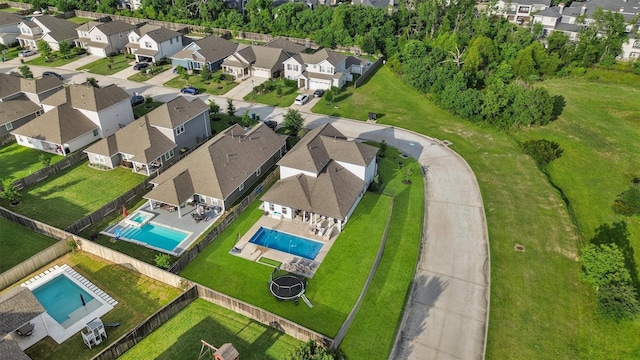 2307 Hagerman Rd, Conroe, TX 77384 - aerial perspective of suburban area featuring a pool