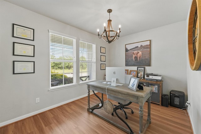 2307 Hagerman Rd, Conroe, TX 77384 - office area with a chandelier and wood finished floors