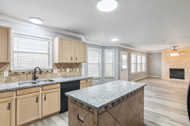 5911 Drenner Park Ln, Houston, TX 77086 - kitchen featuring dishwasher, light brown cabinets, light wood finished floors, a ceiling fan, and a center island